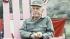 Harry Morgan is shown on the set of M*A*S*H* in...
