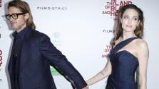 Brad Pitt, left, and Angelina Jolie, writer and director of the film In the Land of Blood and Honey, pose at the premiere in Los Angeles on Thursday, Dec. 8, 2011. - Provided courtesy of AP / Danny Moloshok