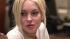 Lindsay Lohan appears at a Los Angeles court on Dec. 14, 2011 for her first progress report under new requirements of her probation after serving a short jail stint for violating it. The judge gave her a glowing review.