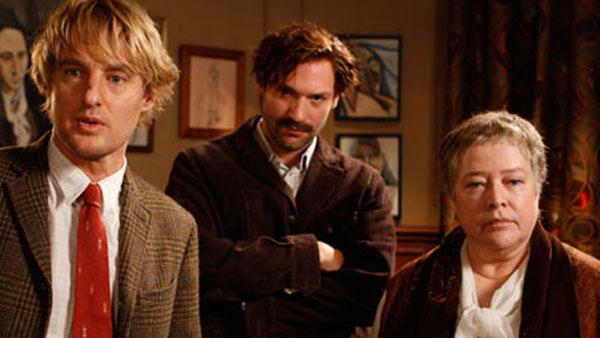 Owen Wilson, Corey Stoll (as writer Ernest Hemingway) and Kathy Bates appear in a scene from the 2011 movie 'Midnight in Paris.'
