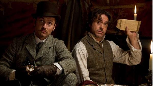 Jude Law and Robert Downey Jr. appear in a still from Sherlock Holmes: A Game of Shadows. - Provided courtesy of Warner Bros. Entertainment / Daniel Smith Jude Law and Robert Downey Jr. appear in a still from Sherlock Holmes: A Game of Shadows. - Provided courtesy of Warner Bros. Entertainment / Daniel Smith