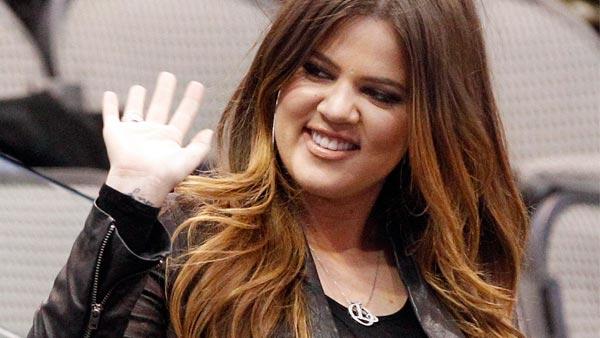 Khloe Kardashian waves to fans before an NBA preseason basketball between the Oklahoma City Thunder and Dallas Mavericks game in Dallas, Sunday, Dec. 18, 2011. - Provided courtesy of AP / LM Otero Khloe Kardashian waves to fans before an NBA preseason basketball between the Oklahoma City Thunder and Dallas Mavericks game in Dallas, Sunday, Dec. 18, 2011. - Provided courtesy of AP / LM Otero