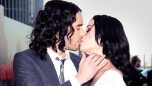 British actor Russell Brand and wife, US singer Katy Perry, kiss on the red carpet as they arrive for the European premiere of Arthur at the O2 Arena. London, Tuesday, April 19, 2011. - Provided courtesy of AP / Joel Ryan