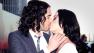 British actor Russell Brand and wife, US singer Katy Perry, kiss on the red carpet as they arrive for the European premiere of 'Arthur' at the O2 Arena. London, Tuesday, April 19, 2011.