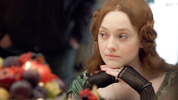 In this Thursday, Nov. 10, 2011 photo U.S actress Dakota Fanning is photographed during a break from filming a scene on the set of the film Effie at West Wycombe Park. - Provided courtesy of AP / Joel Ryan