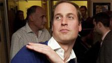 Prince William (pictured) dances with Vanessa Boateng as his wife, Kate, the Duchess of Cambridge, looks on during their visit to Centrepoints Camberwell Foyer in London on Dec. 21, 2011. - Provided courtesy of Prince of Wales Media Centre