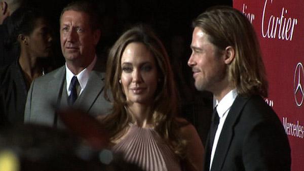 Angelina Jolie stands with Brad Pitt at the Palm Springs International Film Festival on Jan. 7, 2012.