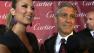 George Clooney talks to OnTheRedCarpet.com at the Palm Springs International Film Festival on Jan. 7, 2012. Pictured on the left is his girlfriend, former WWE star Stacy Keibler.