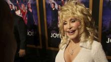 Dolly Parton talks to OnTheRedCarpet.coms George Pennochio at the January 9 premiere of his 2012 film Joyful Noise, which hits theaters January 13. - Provided courtesy of OTRC