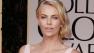 Charlize Theron arrives at the 69th Annual Golden Globe Awards Sunday, Jan. 15, 2012, in Los Angeles.