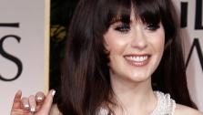 Zooey Deschanel arrives at the 69th Annual Golden Globe Awards Sunday, Jan. 15, 2012, in Los Angeles. - Provided courtesy of AP / Matt Sayles