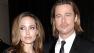 Actress Angelina Jolie, left, and actor Brad Pitt arrive at the 23rd Annual Producers Guild Awards in Beverly Hills, Calif. on Saturday, Jan. 21, 2012. - Provided courtesy of AP / Dan Steinberg
