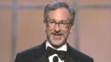 Steven Spielberg accepts an Oscar award for Best Director for Saving Private Ryan in 1999.