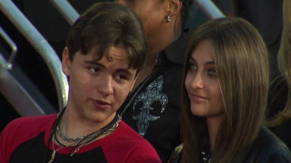 Michael Jackson's son and Prince talks to his sister Paris at the King of Pop's hand and footprint ceremony at the Grauman's Chinese Theatre on Jan. 26, 2012.