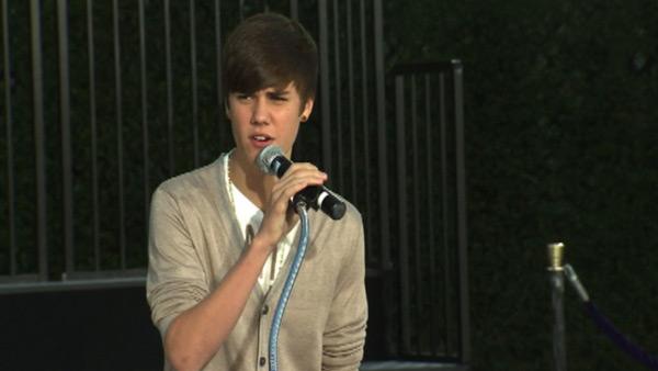 Justin Bieber performs on stage at Michael Jackson's hand and footprint ceremony at the Grauman's Chinese Theatre on Jan. 26, 2012.