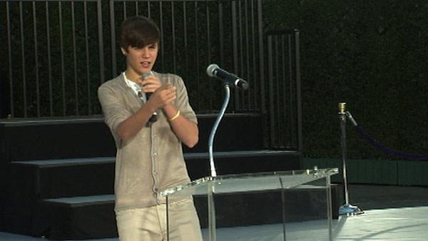 Justin Bieber appears on stage at Michael Jackson's hand and footprint ceremony at the Grauman's Chinese Theatre on Jan. 26, 2012.