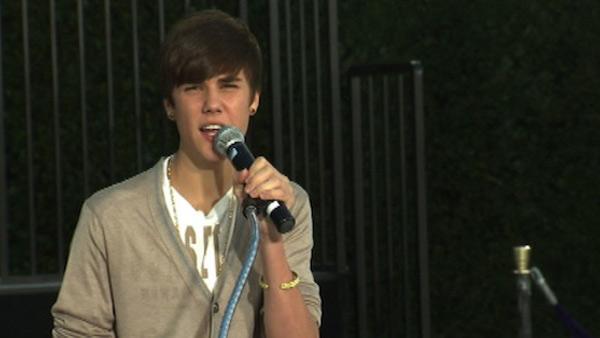 Justin Bieber performs on stage at Michael Jackson's hand and footprint ceremony at the Grauman's Chinese Theatre on Jan. 26, 2012.