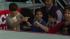 Justin Bieber (left) gestures at Prince...
