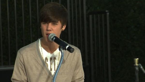 Justin Bieber performs on stage at Michael Jackson's hand and footprint ceremony at the Grauman's Chinese Theatre on Jan. 26, 2012.