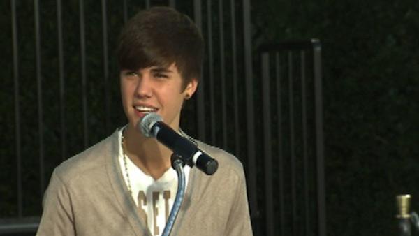 Justin Bieber appears on stage at Michael Jackson's hand and footprint ceremony at the Grauman's Chinese Theatre on Jan. 26, 2012.