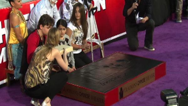 Michael Jackson's children Prince (left), Blanket (middle) and Paris appear at their late father's hand and footprint ceremony at the Grauman's Chinese Theatre on Jan. 26, 2012.