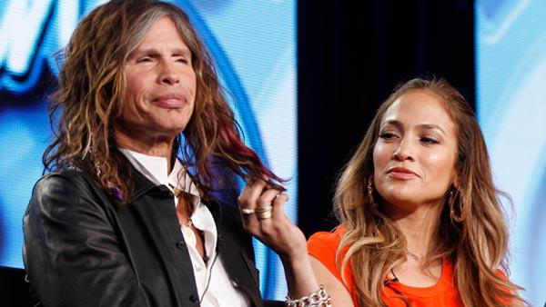 American Idol Judge and musician Jennifer Lopez, right, plays with the hair of fellow judge Steven Tyler of Aerosmith at the American Idol panel at the Fox Television Critics Association Winter Press Tour in Pasadena , Calif. on Sunday, Jan. 8, 2012. - Provided courtesy of AP / Danny Moloshok American Idol Judge and musician Jennifer Lopez, right, plays with the hair of fellow judge Steven Tyler of Aerosmith at the American Idol panel at the Fox Television Critics Association Winter Press Tour in Pasadena , Calif. on Sunday, Jan. 8, 2012. - Provided courtesy of AP / Danny Moloshok