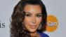 Kim Kardashian arrives at the Pre-Grammy Gala and Salute to Industry Icons at the Beverly Hilton hotel in Beverly Hills, California on Feb. 11, 2012. - Provided courtesy of AP / Vince Bucci