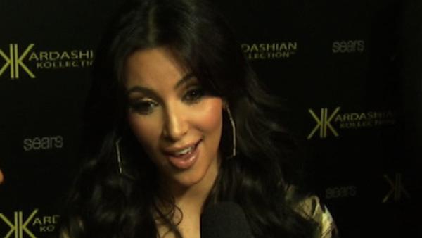 Kim Kardashian talks to reporters at a Los Angeles launch party for the Kardashian Kollection clothing line for Sears on Aug. 17, 2011.