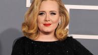 Adele arrives at the 54th annual Grammy Awards on Sunday, Feb. 12, 2012 in Los Angeles. - Provided courtesy of AP / Chris Pizzello