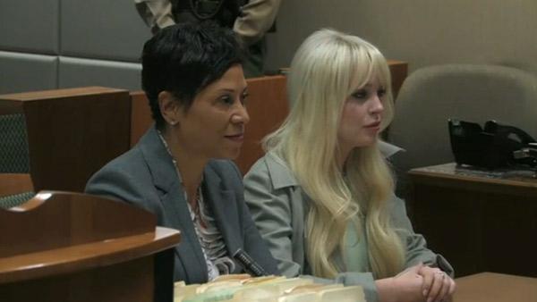 Lindsay Lohan sits by her lawyer, Shawn Holley, at a Los Angeles court on Feb. 22, 2012. - Provided courtesy of OTRC Lindsay Lohan sits by her lawyer, Shawn Holley, at a Los Angeles court on Feb. 22, 2012. - Provided courtesy of OTRC