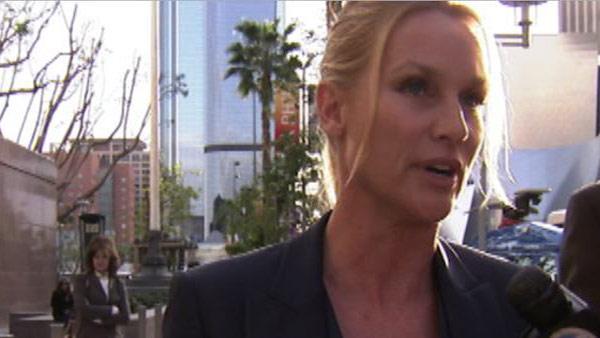 Nicollette Sheridan, formerly of 'Desperate Housewives,' walks into court to testify in her wrongful termination case on Feb. 29, 2012.