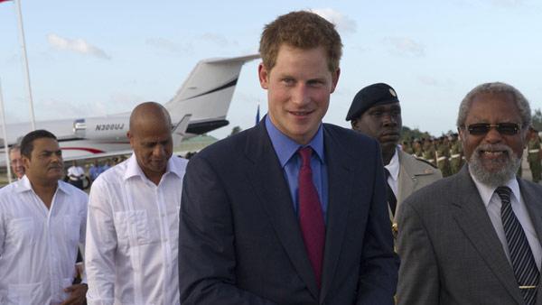 Britains Prince Harry as he arrives at Philip Goldson International Airport, Ladyville, Belize, where he was met by the Governor General of Belize, Sir Colville Young at the start of his tour to mark the Queens Diamond Jubilee, Friday March 2, 2012. - Provided courtesy of AP / Arthur Edwards Britains Prince Harry as he arrives at Philip Goldson International Airport, Ladyville, Belize, where he was met by the Governor General of Belize, Sir Colville Young at the start of his tour to mark the Queens Diamond Jubilee, Friday March 2, 2012. - Provided courtesy of AP / Arthur Edwards