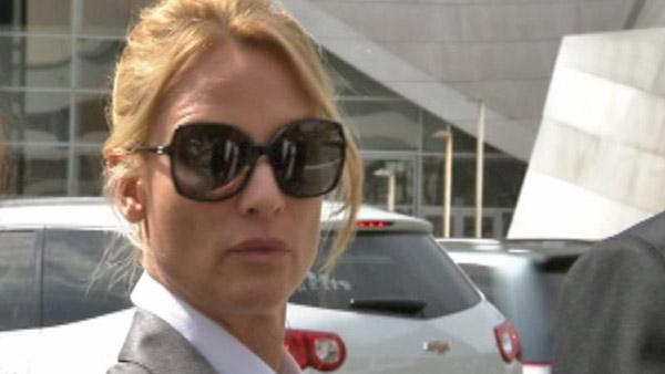 Nicollette Sheridan appears leaving a Los Angeles court during a trial about her 'Desperate Housewives' wrongful termination case on March 5, 2012.
