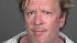 Actor Michael Madsen appears in a mugshot...