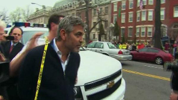 George Clooney is arrested for civil disobedience while protesting outside Sudanese Embassy in Washington, D.C. on March 16, 2012.