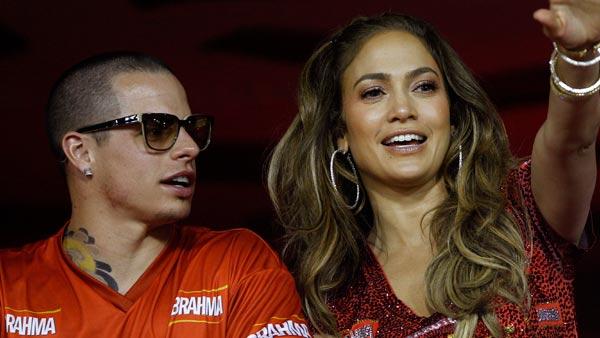Jennifer Lopez waves to people as she watches carnival parades with Casper Smart at the Sambadrome in Rio de Janeiro, Brazil, Sunday Feb. 19, 2012. - Provided courtesy of AP / Victor R. Caivano Jennifer Lopez waves to people as she watches carnival parades with Casper Smart at the Sambadrome in Rio de Janeiro, Brazil, Sunday Feb. 19, 2012. - Provided courtesy of AP / Victor R. Caivano