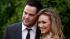 Hilary Duff, right, and Mike Comrie arrive at an...