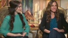 Julia Roberts and Lily Collins appear in a photo from a press junket for their 2012 fairytale film Mirror Mirror on March 23, 2012. - Provided courtesy of OTRC