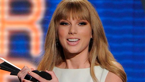 Taylor Swift accepts the award for Entertainer of the Year at the 47th Annual Academy of Country Music Awards on Sunday, April 1, 2012 in Las Vegas. - Provided courtesy of AP / Mark J. Terrill Taylor Swift accepts the award for Entertainer of the Year at the 47th Annual Academy of Country Music Awards on Sunday, April 1, 2012 in Las Vegas. - Provided courtesy of AP / Mark J. Terrill