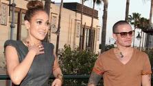 Jennifer Lopez and boyfriend Casper Smart attend the grand opening of restaurant Planet Dailies and lounge Mixology 101 in Los Angeles on April 5, 2012. The event included a screening of the American Idol judges new music video, Dance Again. - Provided courtesy of Christopher Polk / Getty Images