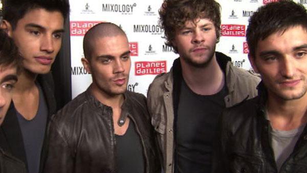 Nathan Sykes, Siva Kaneswaran, Max George, Jay McGuiness and Tom Parker, members of the boy band the Wanted, talk to OnTheRedCarpet.com at the opening of restaurant Planet Dailies and its cocktail lounge Mixology 101 in Los Angeles on April 5, 2012.