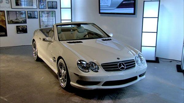This 2005 SL500 -- SL Roadster - Series R 230, photographed at a 2012 exhibit at the Warner Brothers Studios showcasing Mercedes-Benz automobiles featured in the movies.