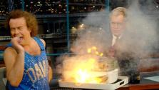In this photo released by CBS, author and fitness personality Richard Simmons, left, reacts to an explosion under the vegetable steamer as host David Letterman watches on the Late Show with David Letterman Wednesday, Nov. 29, 2006 in New York. - Provided courtesy of AP Photo/CBS, J.P. Filo