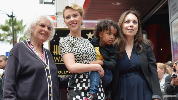 Scarlett Johansson poses with her grandmother, Dorothy, adopted sister, Fenan, and mother, Melanie, as she receives a star on the Hollywood Walk of Fame on May 2, 2012, two days before the release of her new film, The Avengers. - Provided courtesy of Walt Disney Studios Publicity