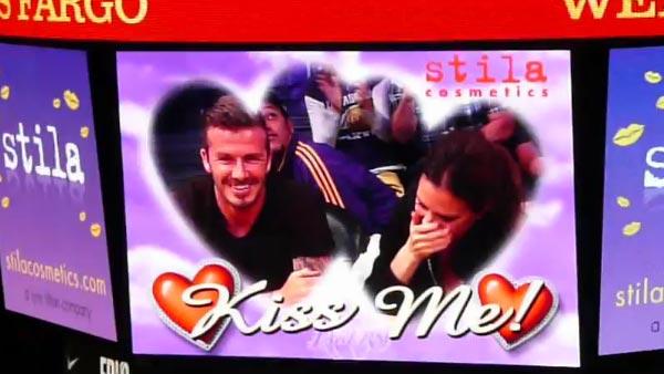 David Beckham and his wife Victoria are caught on kiss cam as they watch an NBA first-round playoff basketball game between the Los Angeles Lakers and the Denver Nuggets at Staples Center in Los Angeles on May 1, 2012.