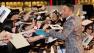 Actor Will Smith, right, gives his autographs to fans during the Japan premiere of his new movie Men in Black III in Tokyo, Tuesday, May 8, 2012. - Provided courtesy of AP / Koji Sasahara
