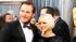 Chris Pratt, left, and Anna Faris arrive before...