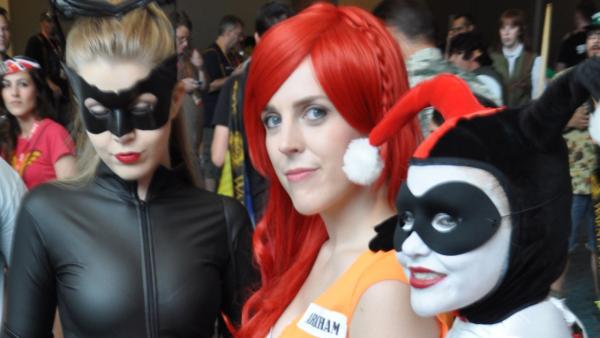 Fans dressed as Catwoman, Poison Ivy and Harley Quinn appear in a photo at San Diego Comic-Con on Thursday, July 12, 2012. - Provided courtesy of OTRC
