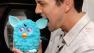 'Twilight' star Jackson Rathbone bites the ear of a Furby at Backstage Creations' Celebrity Retreat at the 2012 Teen Choice at the Gibson Amphitheatre in Universal City, California, near Los Angeles on July 22, 2012.