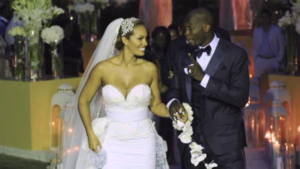 Evelyn Lozada and Chad 'Ochocinco' Johnson appear at their July 4, 2012 wedding, as seen in promotional photos for their VH1 reality show, 'Ev and Ocho.'